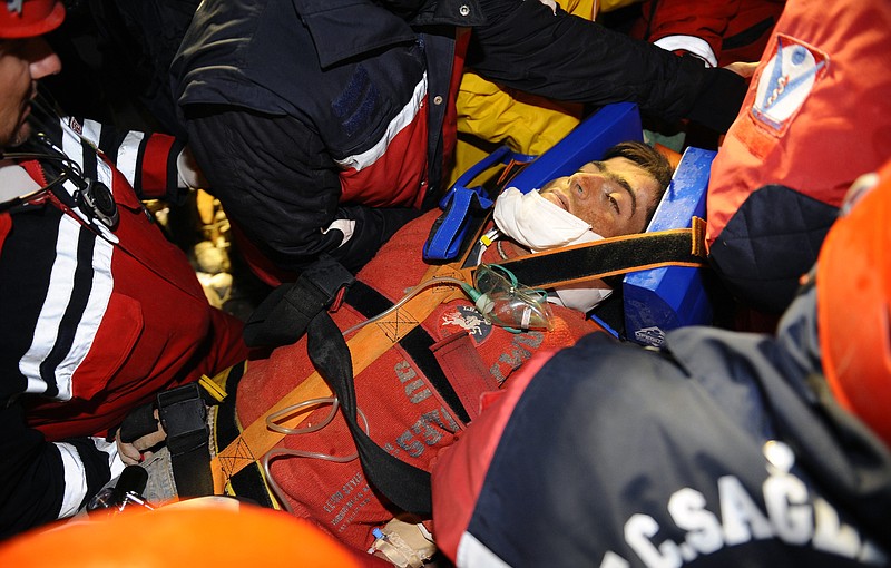 Turkish rescuers Thursday pulled out 18-year-old Imdat Padak from the debris of a collapsed building more than 100 hours after Sunday's quake in Ercis, eastern Turkey, Thursday, Oct. 27, 2011. The death toll reached 534 after Sunday's powerful quake hit eastern Turkey.