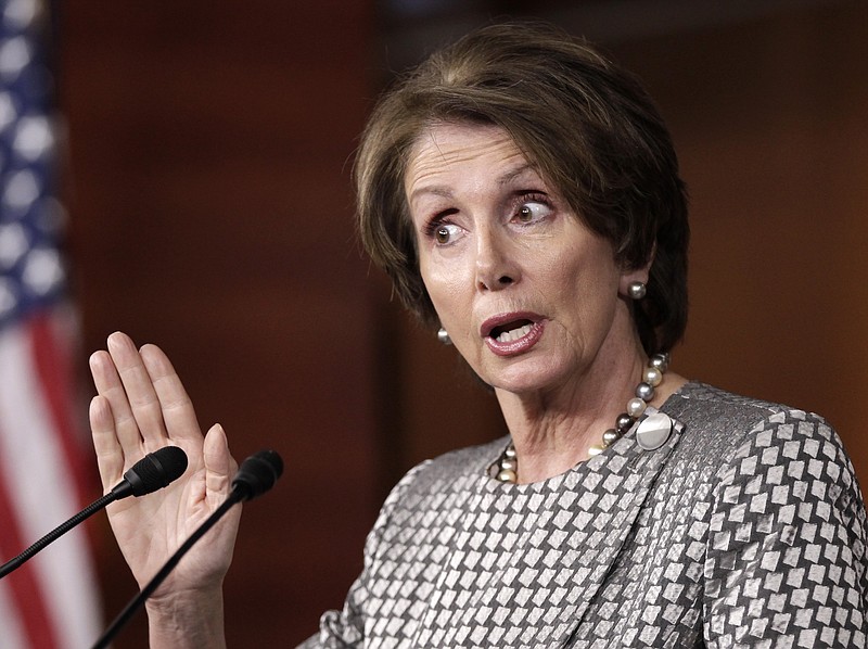 House Minority Leader Nancy Pelosi of Calif., gestures during a news conference Thursday on Capitol Hill in Washington  to caution the deficit reduction supercommittee about not using retirement benefits to fix the nation's debt problems.