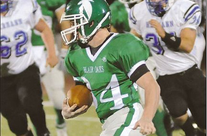 Josh Hughes of Blair Oaks looks for yardage during last Friday's game against Hermann at the Falcon Athletic Complex.