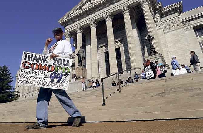 Protesters from all parts of central Missouri participate in a Where Are The Jobs/Occupy the Capitol rally on the steps of the Missouri State Capitol in Jefferson City on Saturday.