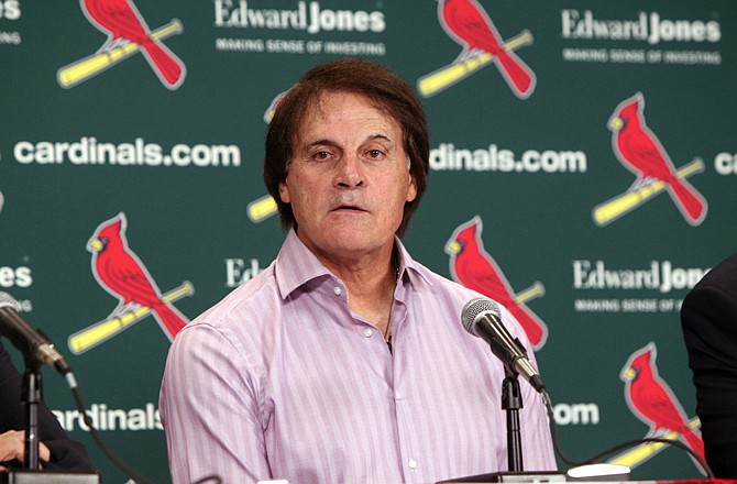 Cardinals manager Tony La Russa retired three days after winning a dramatic, seven-game World Series against the Rangers.