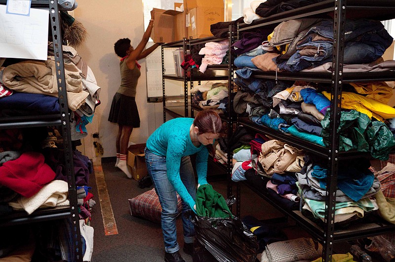 Volunteers from the Occupy Wall Street protests organize donated clothing at the storage and distribution center on Broadway, in New York. The space is provided free of charge by United Federation of Teachers. Major clothing labels such as American Apparel are regular contributors. 
