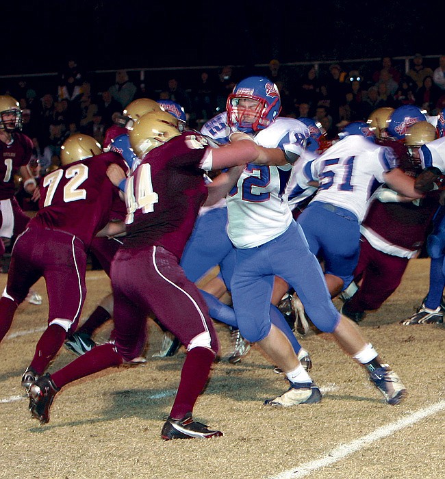 California's Connor McGill (82) and Eldon's Matt Pehle face off during the Pintos' district game.