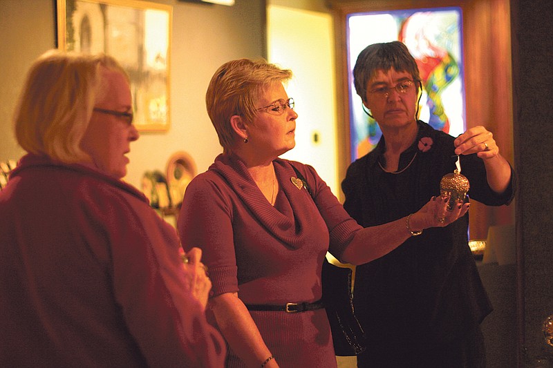 Westminster's President's wife Jane Forsythe looks at ornaments at the Churchill Memorial Victorian Christmas in 2010 with Michele Bowmaster, of Fulton, and Victoria Quinault. The event kicks off this year on Nov. 10 with the Friends of the National Churchill Museum's English Kettledrum Tea from 10 a.m. until 2 p.m. and Cocktails and Shopping from 5-8 p.m. Entry into both events - and the museum, for the day - is free.