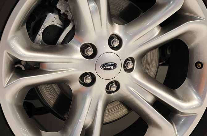This Oct. 28, 2011 photo, shows a wheel of a 2012 Ford Explorer at the 41st annual South Florida International Auto Show, in Miami Beach, Fla.