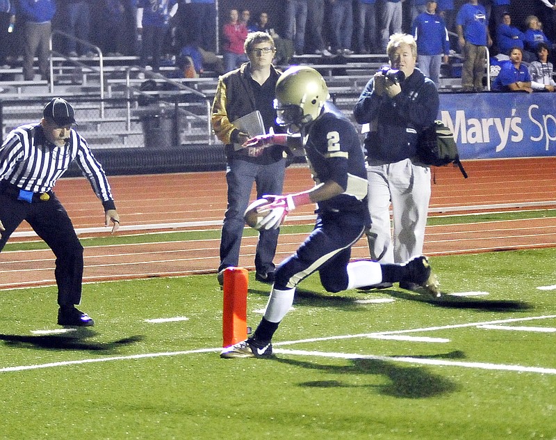 Helias wide receiver Anthony Woodruff scores a touchdown during Wednesday night's game at Adkins Stadium.