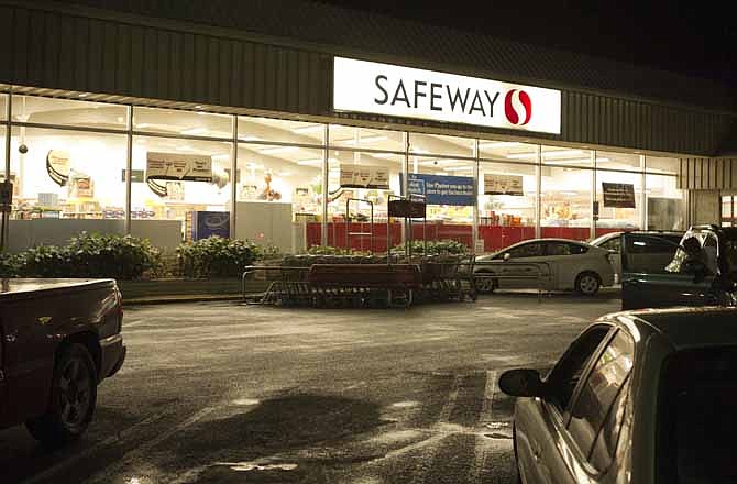 The Safeway grocery store on Beretainia is seen Nov. 3, 2011, in Honolulu. A Honolulu couple, the Leszczynskis, were arrested last week after eating a sandwich at Safeway and forgetting to pay for it with the rest of their groceries. The couple's 2-year-old daughter was taken away by Child Welfare Services after the arrest. 