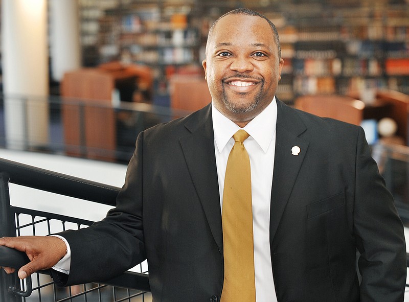 In this November 2011 photo, Jerome Offord Jr. is shown in his position as the head librarian at Lincoln University's Inman Page Library.