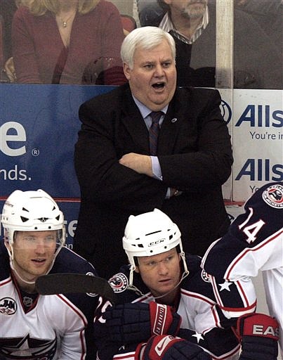 In this March 7, 2009, photo, then-Columbus Blue Jackets coach Ken Hitchcock yells during the Blue Jackets' NHL hockey game against the Detroit Red Wings in Detroit. The St. Louis Blues have changed coaches after a disappointing 6-7 start, firing Davis Payne and hiring Hitchcock to a contract through next season.