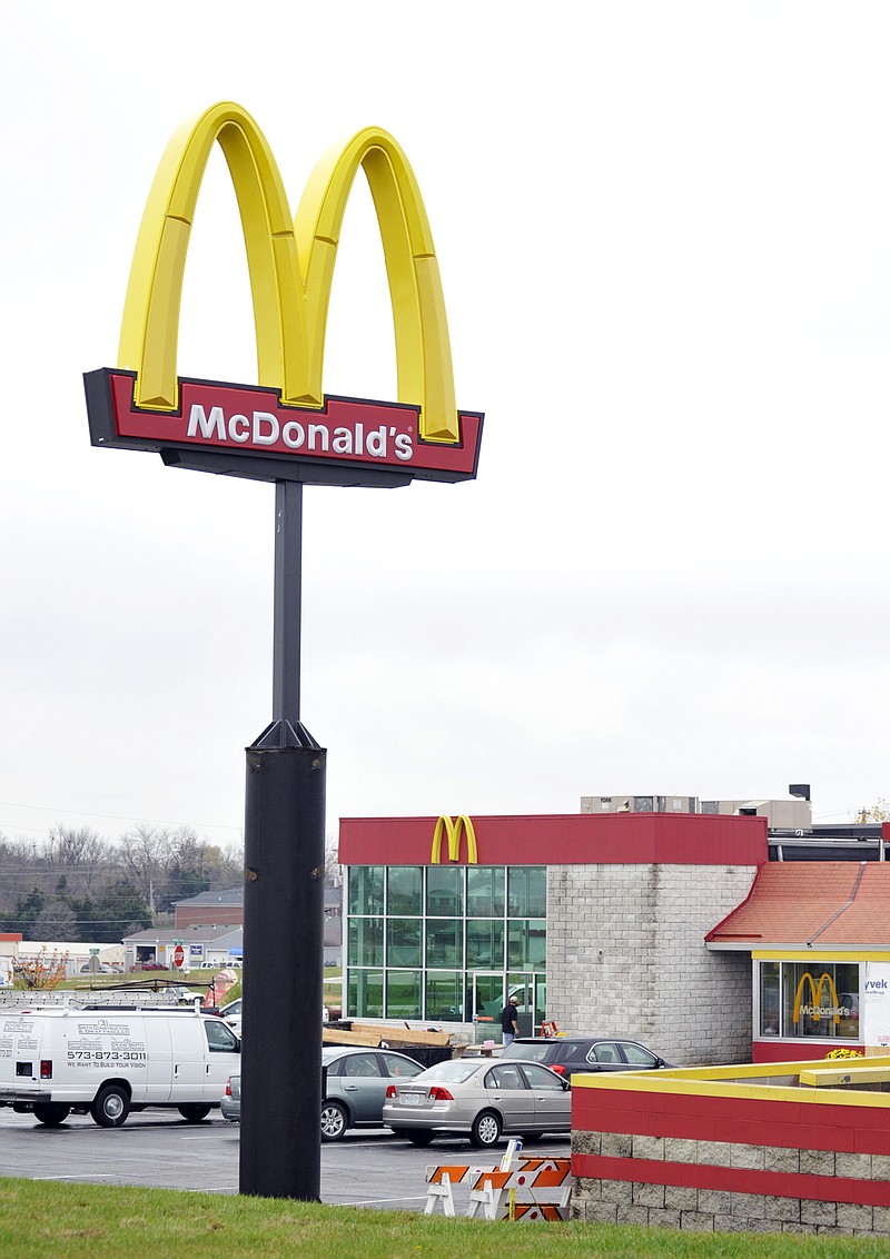 The 1959 orginal-style neon McDonald's sign has been removed and replaced with its modern equivalent at the Holts Summit McDonald's as part of the restaurant's renovations.