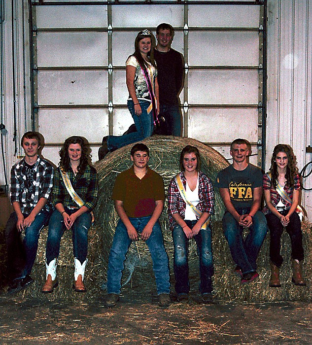 Queen Rachel Oerly and King Wyatt Martensen, seniors, preside over the 2011 Barnwarmin' Court. The Court is, from left, juniors Courtland Gerhart and Leah Davis; freshmen Matt Oerly and Rylee Glenn; and sophomores Luke Burger and Libby Martin. 