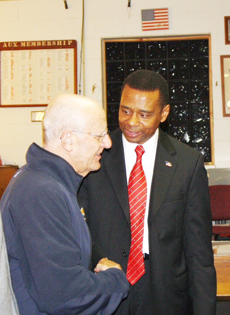 Guest speaker Byron Bagby, a Fulton native and recently-retired major general with the U.S. Army, exchanges "thank yous" with Fulton resident Gene West after the 93rd Annual Veteran's Day Banquet hosted by the American Legion Kingdom Post 210 and Fulton VFW Post 2657 Friday night. Bagby made a request at the end of his speech that everyone present thank veterans for their service every day, not just once a year.