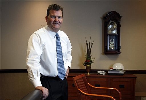 Dave Spence, 53, poses for a photo in his office Tuesday, Nov. 8, 2011, in St. Louis. Spence, the owner of a plastic bottle manufacturer, says he is seriously considering a campaign for Missouri governor even if it means a Republican primary run against Lt. Gov. Peter Kinder who is also expected to run. 