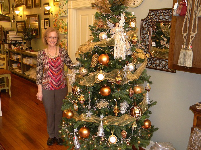 Patricia Kay with some of the decorations in her shop located on High Street during the Open House held Saturday, Nov. 12.