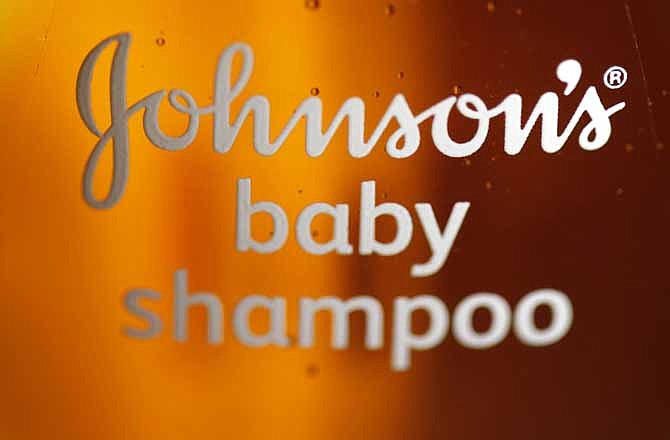This file photo taken April 19, 2010 shows Johnson & Johnson's baby shampoo in Philadelphia. Amid pressure from activists, Johnson & Johnson on Wednesday, Nov. 16, 2011 said that it is continuing efforts to remove traces of two harmful chemicals from its baby products around the world. 