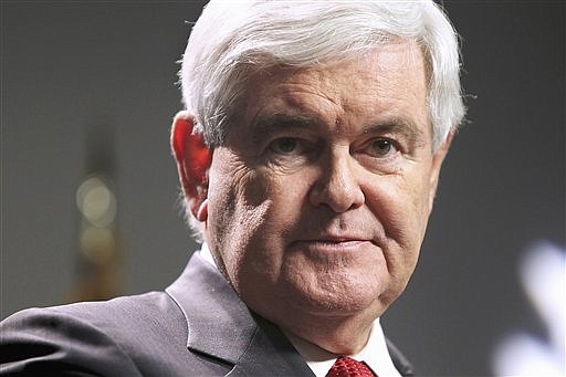 In this Nov. 21, 2011 file photo, Republican presidential candidate, former House Speaker Newt Gingrich speaks at a town meeting at St. Anselm College in Manchester, N.H.