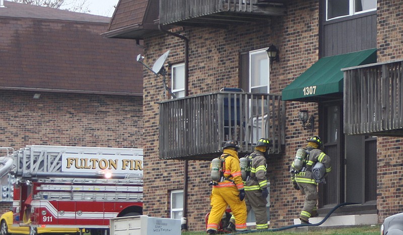 In this 2011 file photo, Fulton firemen enter a Westview Apartment building during an early morning fire.