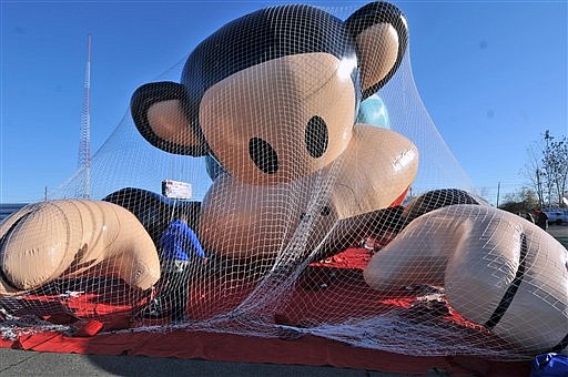 Paul Frank's monkey Julius is inflated at the Macy's Balloonfest outdoor test flight of the parade's newest giant balloons Saturday, Nov. 5, 2011 at the Meadowlands in East Rutherford, N.J. (AP Photo/The Record of Bergen County, David Bergeland)