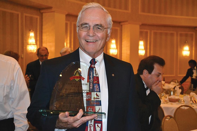 Former St. Louis Cardinals' outfielder Charlie James poses with his St. Louis Award trophy during a presentation at the St. Louis Sports Hall of Fame on Nov. 16. James, a Fulton resident, was one of 16 members of the 1964 World Championship team that was honored at the event. 