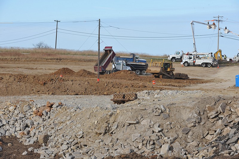 Dumptruck drivers, heavy equipment operators and electrical linemen are all very busy working at the site of the future location of the new Riley Toyota Scion on Christy Drive in Jefferson City. 