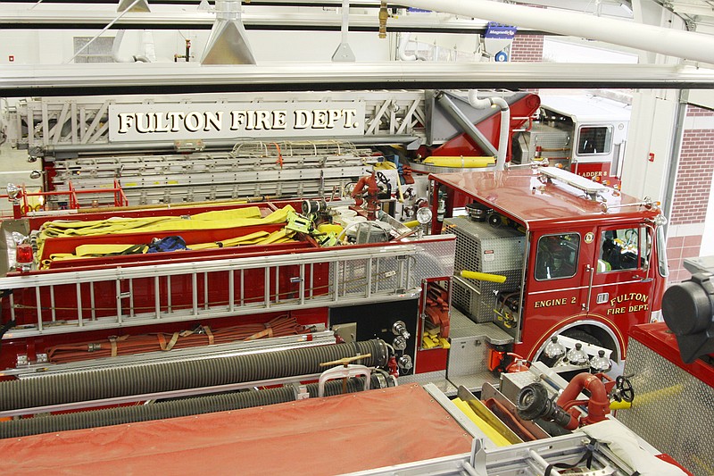 Fulton firefighters back some of the department's equipment into its new home at the Tennyson Road station. The city will host a ribbon cutting and open house at the new station from 10 a.m. until 4 p.m. on Dec. 15.