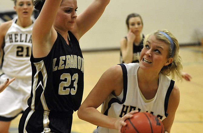 Helias forward Emma Verslues eyes the basket against Lebanon on Monday at Rackers Fieldhouse.