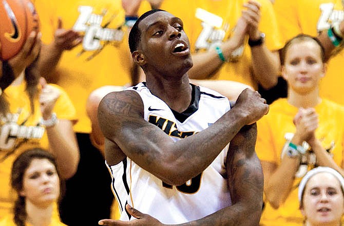 Ricardo Ratliffe, shown here celebrating after scoring two of his 22 points against Northwestern State last Friday at Mizzou Arena, and the Missouri Tigers will face the Villanova Wildcats tonight in New York.