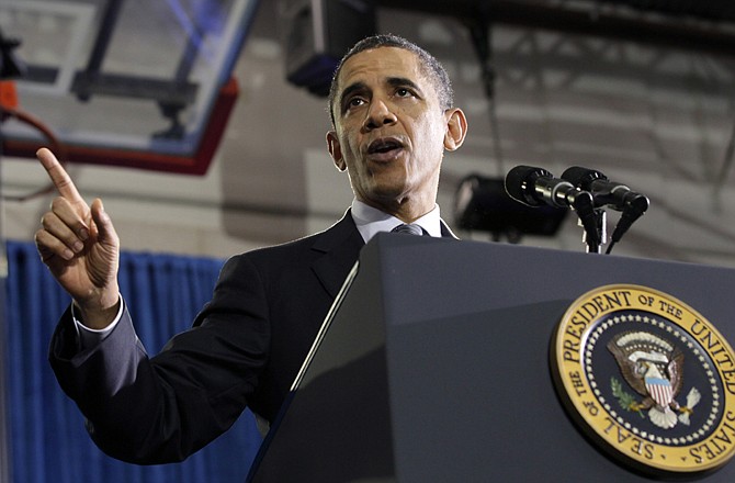President Barack Obama speaks Tuesday about the economy at Osawatomie High School in Osawatomie, Kan.