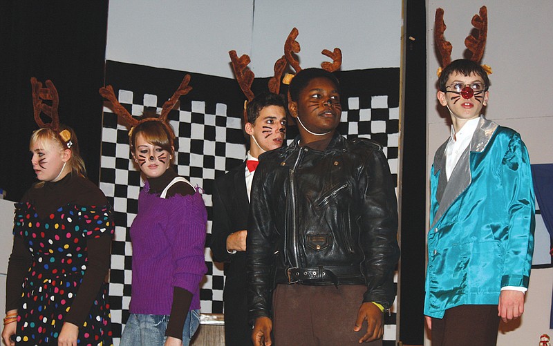 Members of Fulton High School's theater group The Rising Stars perform the play "If You Give a Reindeer a Gingerbread" Wednesday afternoon for kindergartners and first-graders from Bartley Elementary School. The play will also be performed at 7 p.m. Dec. 13. Admission is $2.