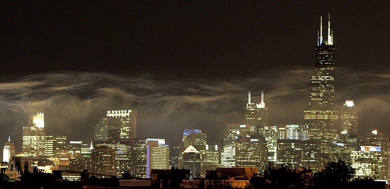 Smoke from a fireworks display filters through the Chicago skyline. While Chicago has dominated the state's politics more often than not in its 193 year history, two lawmakers from central Illinois now are pitching to lop Chicago and Cook County off from the rest of Illinois and make it stand alone as the nations 51st state.