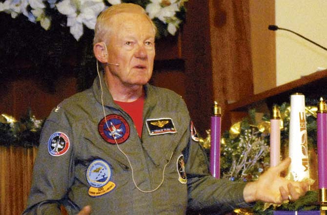 Charlie Plumb, a Vietnam Veteran speaks to the crowd about his experiences in Vietnam and as a prisoner of war at the "It's Never Too Late To Welcome The Home" event held Saturday at The First United Methodist Church in Jefferson City.