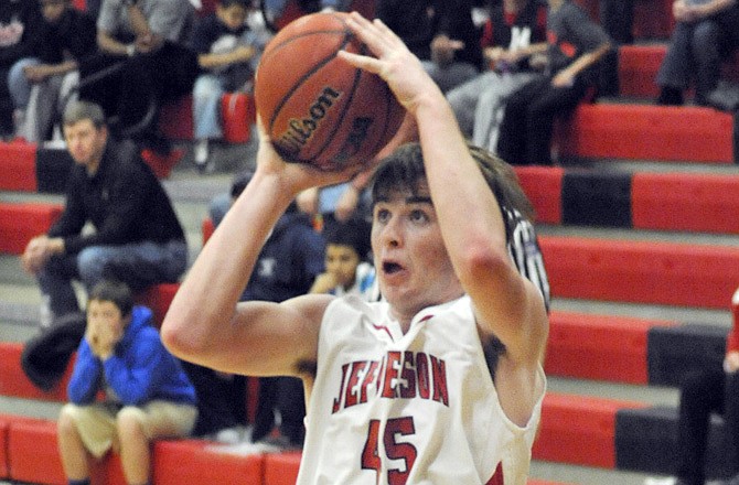 Jays forward Scott Stegeman (45) attempts a jump shot during the third quarter of Jefferson City's win against Hickman Tuesday at Fleming Fieldhouse. 