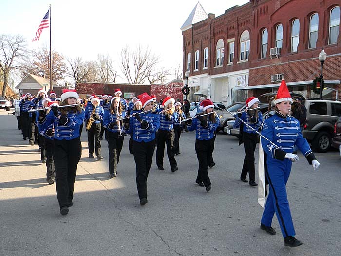 The Russellville High School Marching Band plays during the parade.