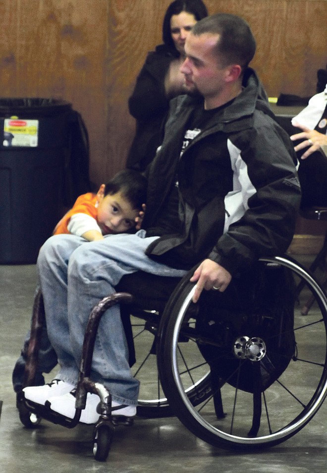 Tyler Huffman with his son.