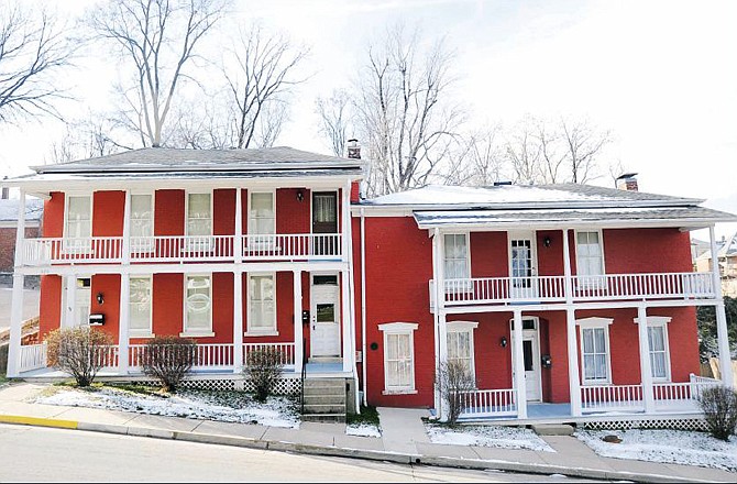 The Green Revival-style building at East State Street was formerly the Jefferson Female Seminary that was saved from demolition in the late 1990s.