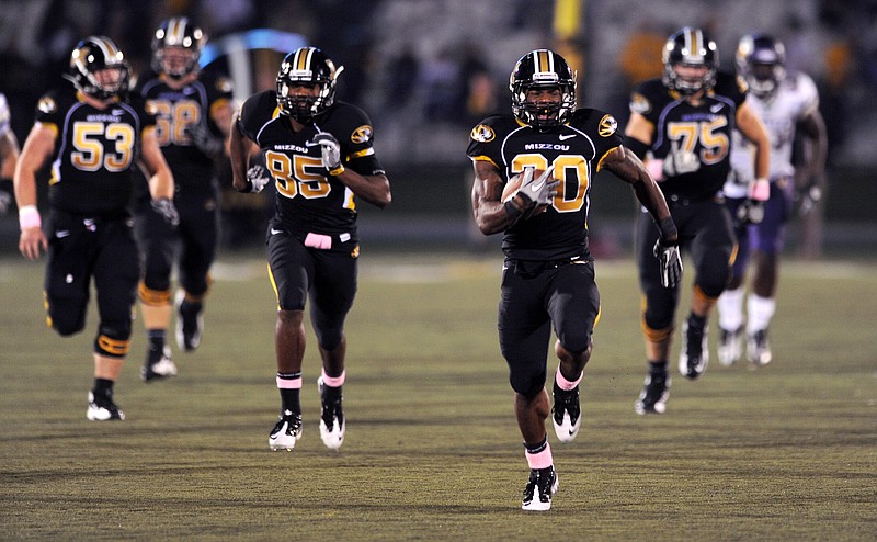As Missouri running back Henry Josey rips off a 68-yard touchdown run against Western Illinois this season, teammates Marcus Lucas (85) and Travis Ruth (53) trail the play. Ruth, a former Jefferson City Jay, will play against another former Jay, Sylvester Williams, in Monday's Independence Bowl.