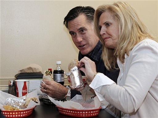 Republican presidential candidate, former Mass. Gov. Mitt Romney and his wife Ann eat burritos at Dos Amigos Burritos while campaigning in Concord, N.H. Friday, Dec. 23, 2011.