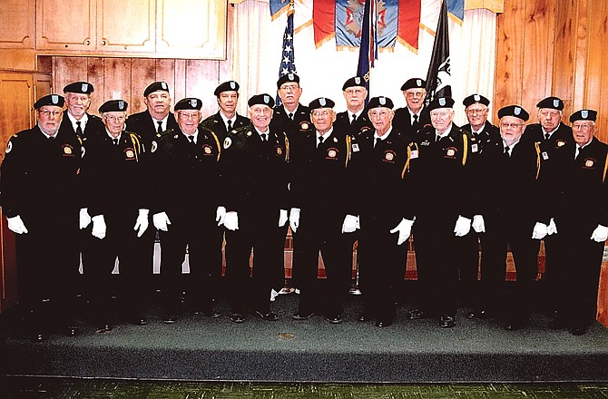 Members of the VFW Post 1003 Honor Guard commemorate 10 years of providing military funeral honors.
