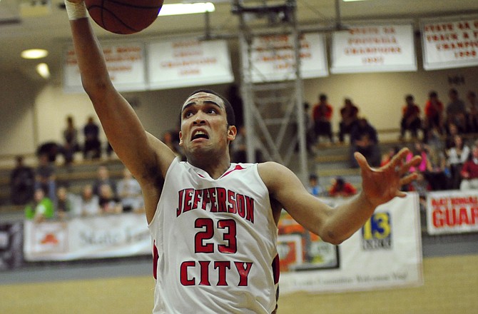 Michael Washington of the Jays goes up for a layup during Wednesday night's game against Fayetteville in the Mike Kehoe Great 8 Classic at Fleming Fieldhouse.