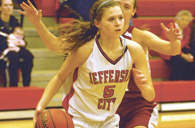 Sadie Theroff, who pumped in 29 points for Jefferson City, drives to the bucket during Friday's win over St. Joseph Benton at Fleming Fieldhouse.