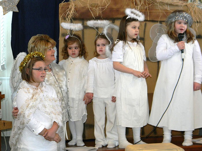 Angels sings "Hark! the Herald Angels Sing" during the Flag Spring Baptist Church, California, Christmas Program held Sunday, Jan. 1.