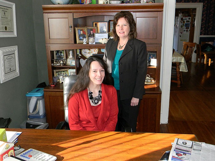 Karla Strobel, CPA, standing, who has over 30 years of accounting experience with daughter Karey Freiner, CPA, who has 10 years of accounting experience. Together, they make up Strobel-Freiner CPA, LLC., located at 205 South Oak Street, California.