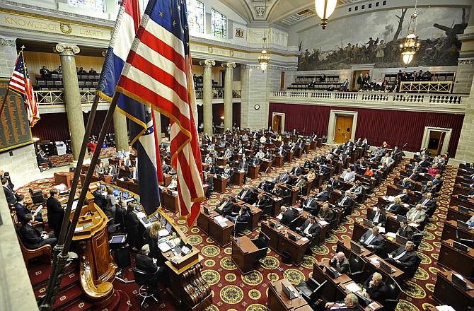 State representatives fill the House floor during Wednesday's convening of the 96th General Assembly at the Capitol.