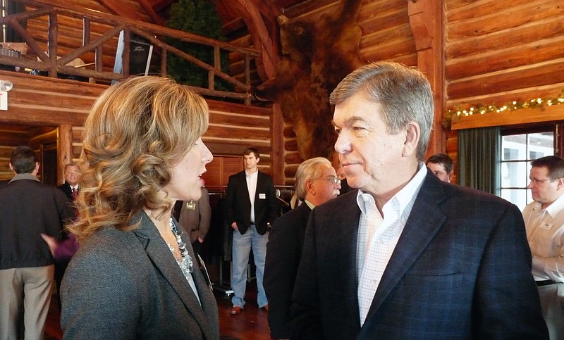 Lake Area Chamber of Commerce executive director Wendy White speaks with U.S. Senator Roy Blunt at a "meet and greet" Wednesday at Lake of the Ozarks. Blunt was in town to assure lake area property owners he will keep fighting for the rights of shoreline property owners.