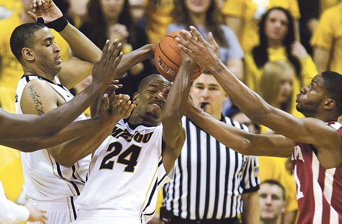 Kim English of Missouri goes up for two of his 23 points during Tuesday night's win over Oklahoma at Mizzou Arena.