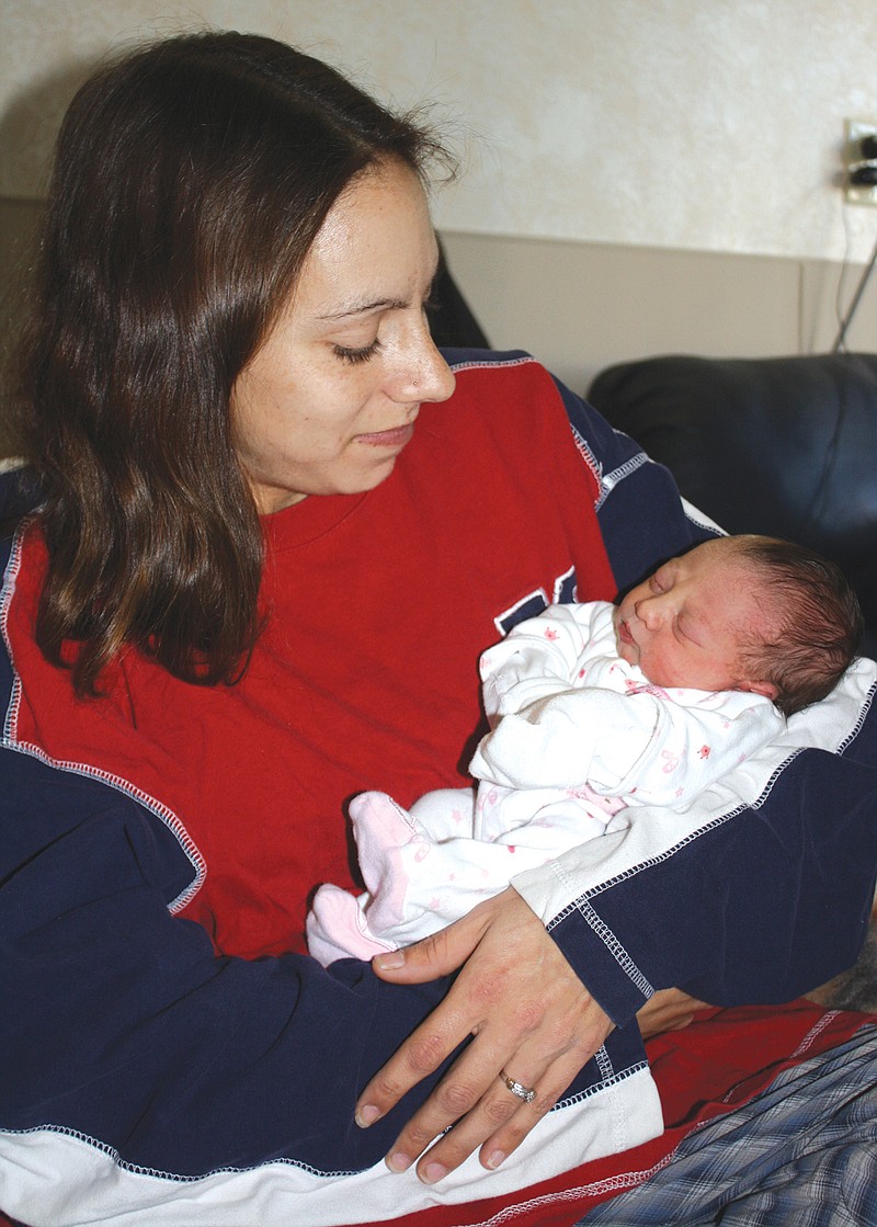 Ashley Johnson, of Jefferson City, holds daughter Jazmynn Marie Johnson at Callaway Community Hospital Thursday afternoon. Jazmynn, who arrived at 2:17 a.m. on Wednesday, was the first baby born in Callaway in 2012.