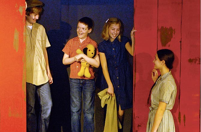 Boxcar children Henry, Benny, Violet and Jessie have found the rail car in this rehearsal of a scene from the play "The Boxcar Children." 