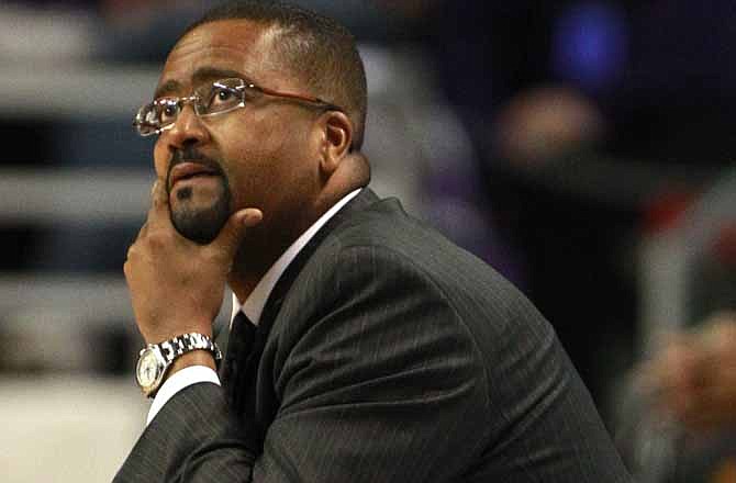 Missouri coach Frank Haith looks up at the clock during the first half of an NCAA college basketball game against Kansas State, Saturday, Jan. 7, 2012, in Manhattan, Kan.