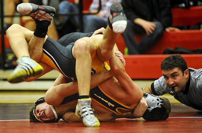 Hunter Neighbors of Jefferson City (facing left) works Matt Lazo of Lebanon toward his back during a match earlier this season at Fleming Fieldhouse. Neighbors and the Jays will host nine other teams in this weekend's Capital City Invitational.
