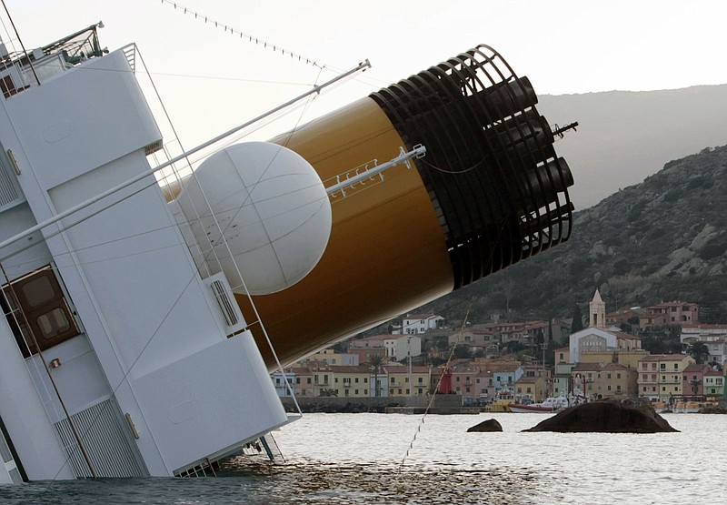 The Costa Concordia ran aground Friday night off the tiny Tuscan island of Giglio, Italy, sending water pouring in through a 50-meter gash in the hull and forcing the evacuation of some 4,200 people from the listing vessel early Saturday, the Italian coast guard said. Three people were confimed dead, and authorities were still searching for missing people more than 24 hours later.